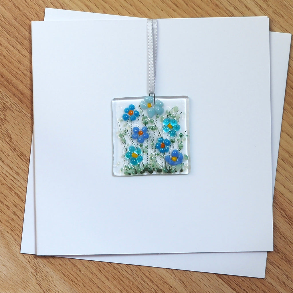 Blue daisy flowers glass greetings card