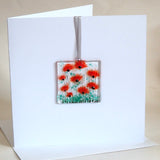 Red poppy flowers glass greetings card