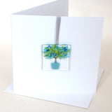 Blue tree in a pot glass greetings card