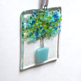 Blue tree in a pot glass greetings card