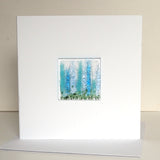 Tall blue and turquoise flowers greetings card