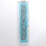 Oak leaf glass wall art panel. Clear fused glass with copper and aluminium fused between the layers.