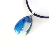 Blue and white pebble style fused glass pendant