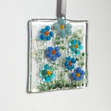 Blue daisy flowers glass greetings card