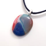 Light blue and red pebble style fused glass pendant