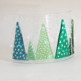 Candle screen - row of fused glass Christmas trees