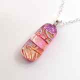 Pink and gold fused dichroic glass pendant