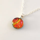 Orange and yellow fused dichroic glass pendant