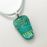 Turquoise green fused dichroic glass pendant