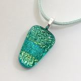 Turquoise green fused dichroic glass pendant