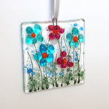 Turquoise and pink daisy flowers glass greetings card