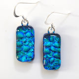 Blue and green turquoise dichroic glass earrings with a pebble pattern handmade in Horsham England by Fired Creations
